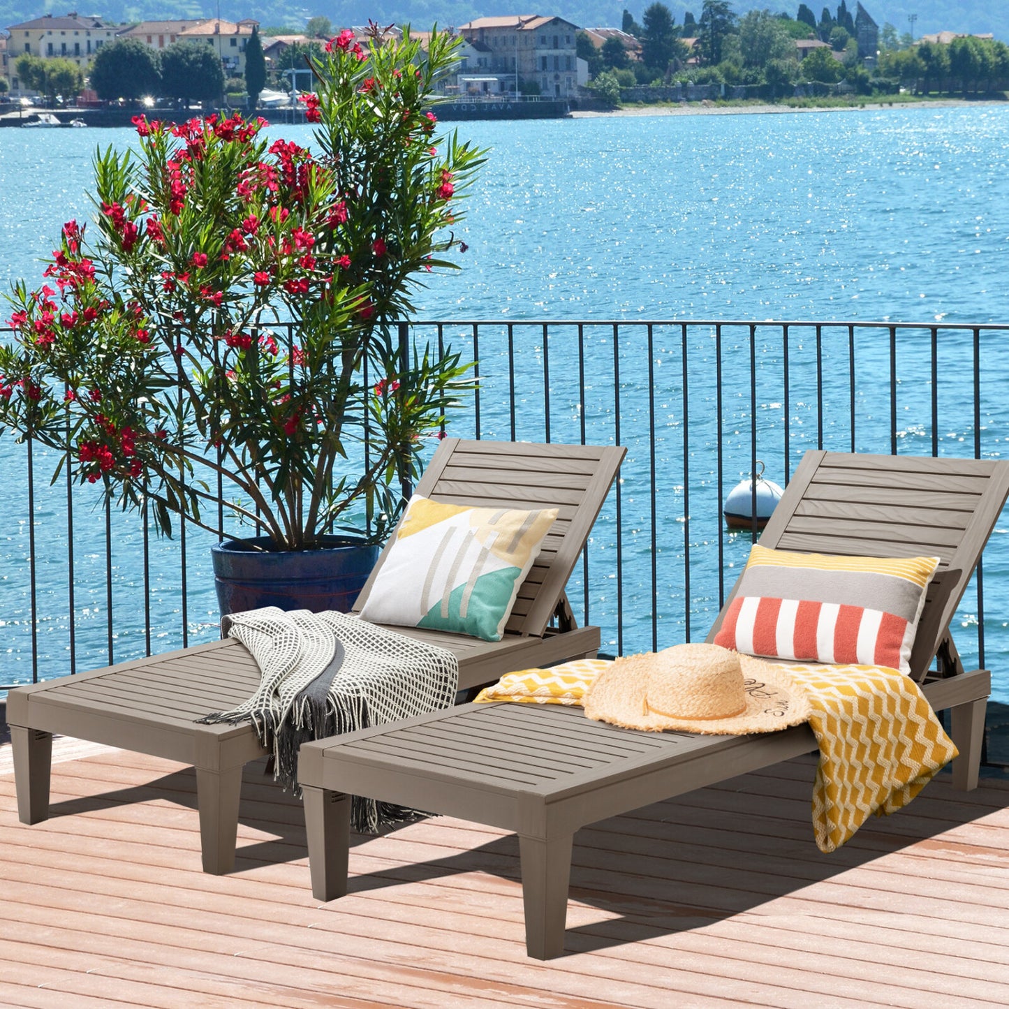 Set of 2 black outdoor chaise lounge chairs with adjustable backrests, ideal for patio relaxation and outdoor seating.