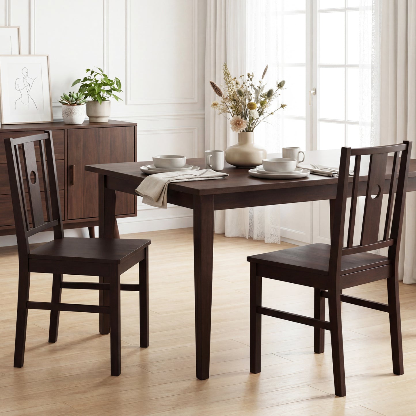 Set of 2 solid rubber wood kitchen chairs with slatted curved backrests, ideal for dining rooms and casual kitchens.