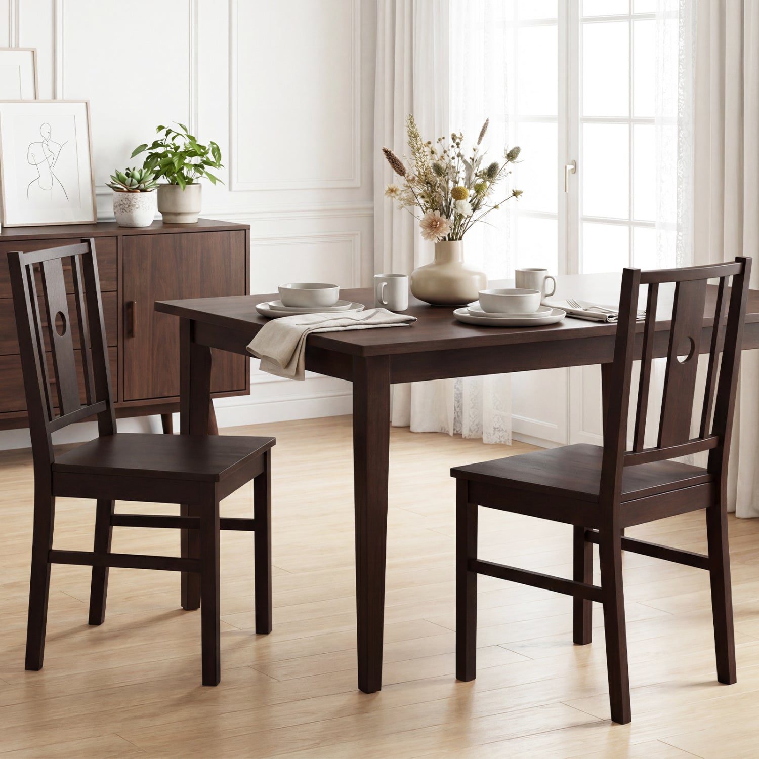 Set of 2 solid rubber wood kitchen chairs with slatted curved backrests, ideal for dining rooms and casual kitchens.