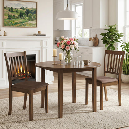 Set of 2 black wooden dining chairs with upholstered seats and rubber wood frames, ideal for kitchen and dining areas.