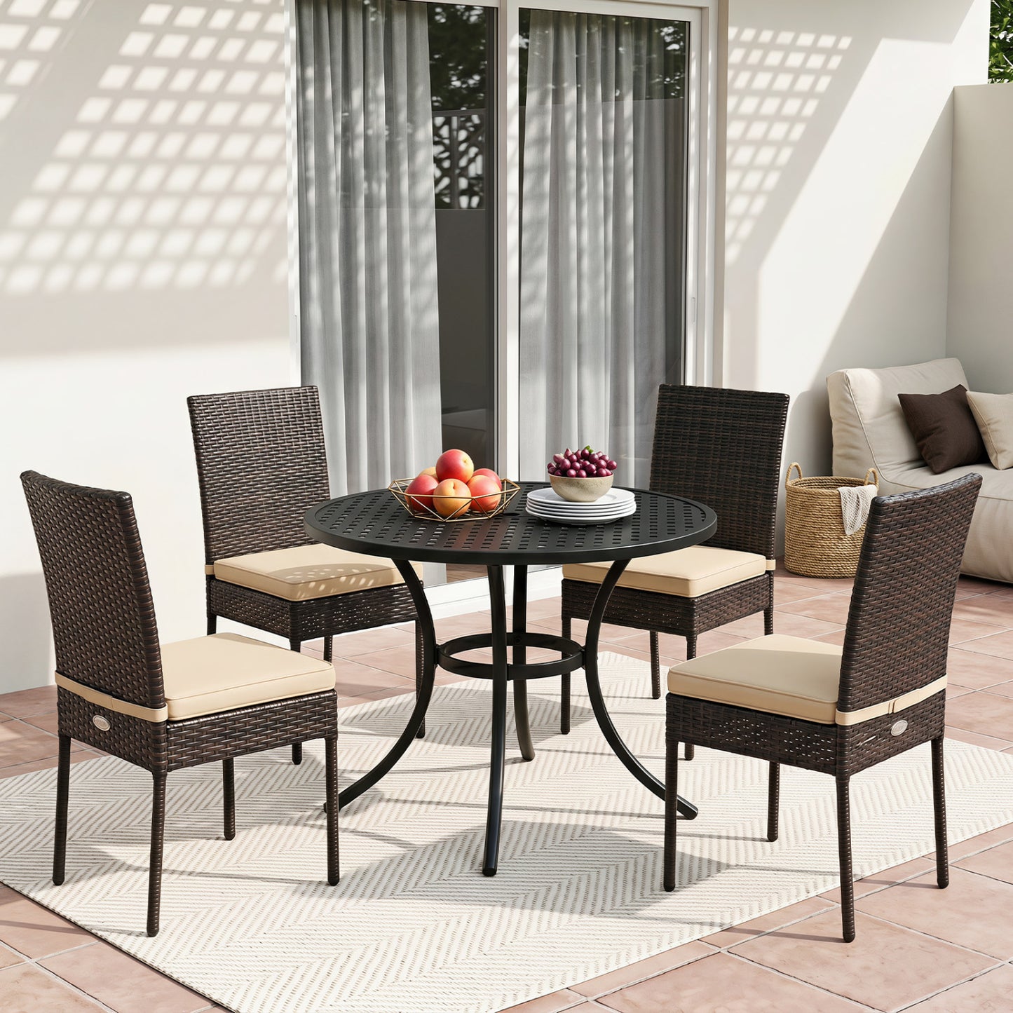 Set of 4 brown patio rattan wicker dining chairs with soft cushions for outdoor patio seating.