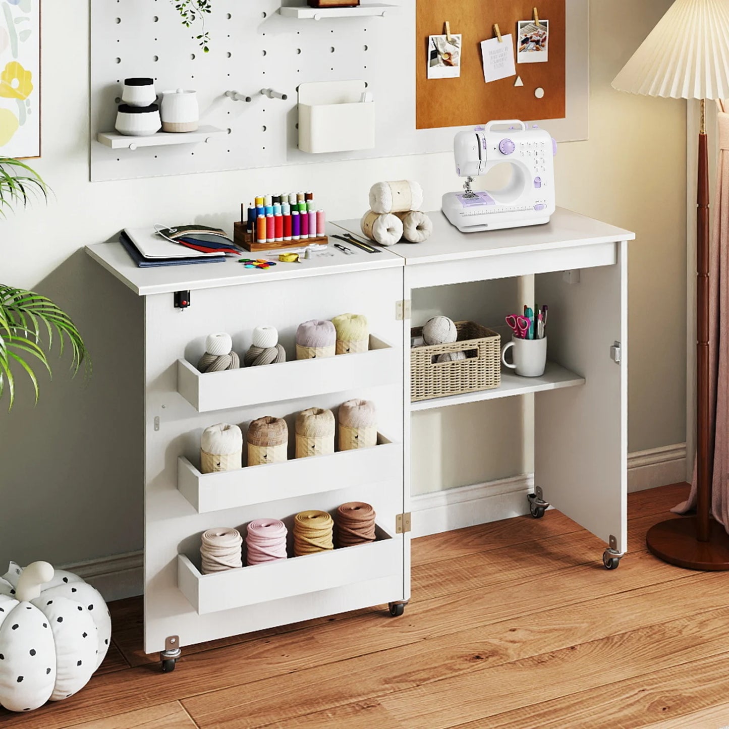 Foldable craft desk with built-in charging station and beginner sewing machine, designed for home office and sewing projects.