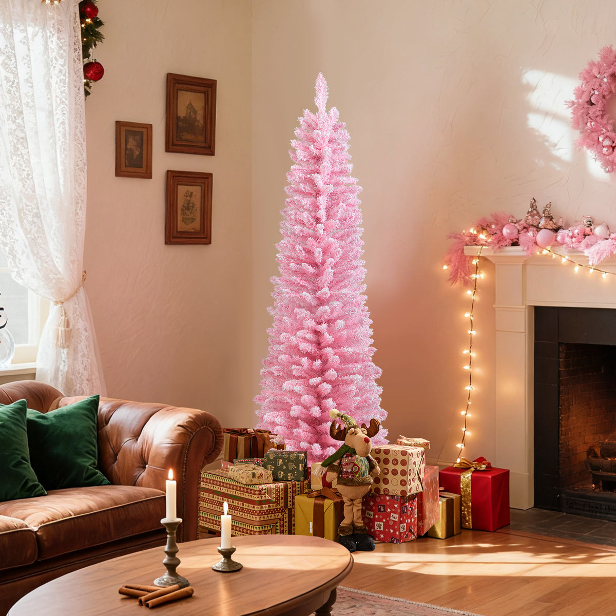 Pink snow-flocked 5 ft artificial Christmas tree with 328 branch tips, holiday decor by Wilsons Home Store.