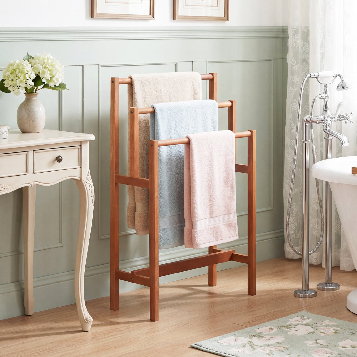 Solid wood 3-tier freestanding towel rack with teak oil finish, ideal for bathroom organization and stylish towel storage.