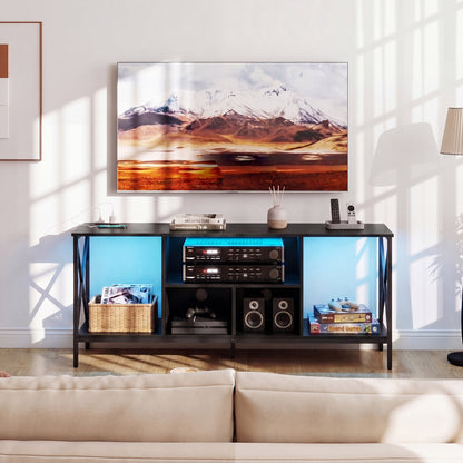 Black TV stand with LED lights for 65-inch TVs, featuring power outlets, modern entertainment center by Wilsons Home Store