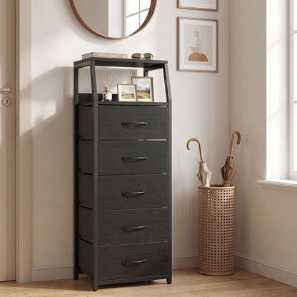 Black tall dresser with five fabric drawers, bedroom storage chest with 7-tier design and modern furniture style.