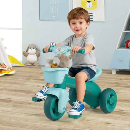 Green toddler tricycle with limited steering, front baskets, and bell, designed for young children, from Wilsons Home Store.