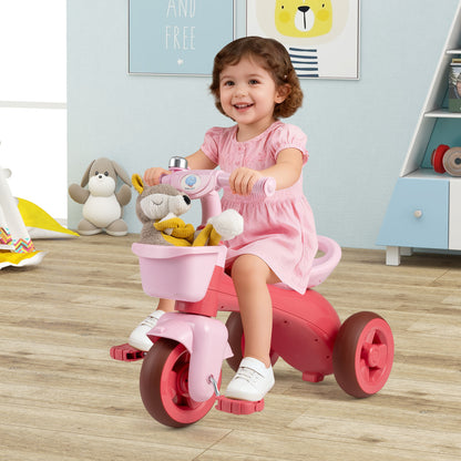 Green toddler tricycle with limited steering, front baskets, and bell, designed for young children for safe ride-on fun.