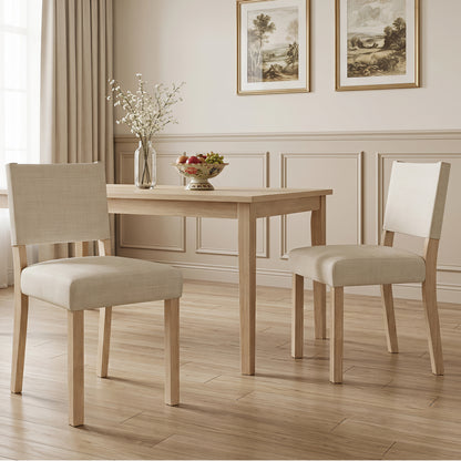 Set of two beige upholstered dining chairs with solid rubber wood legs, stylish kitchen and dining room furniture by Wilsons Home Store
