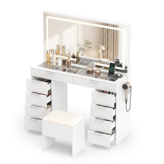 White vanity desk with mirror, built-in lights, matching stool, and charging station, ideal for makeup and bedroom organization.