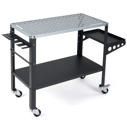Welding table 36x18 inches with lockable wheels, 144 fixture holes, and tool slots, suitable for outdoor garage workspace.