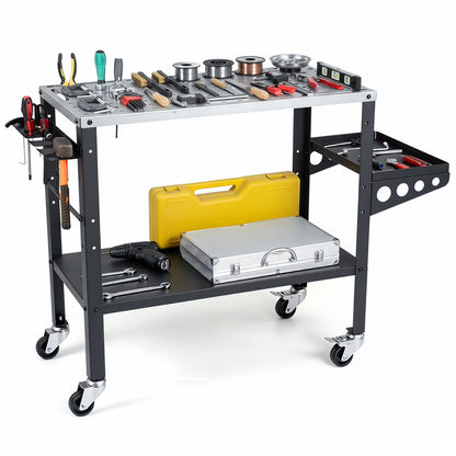 Welding table 36x18 inches from Wilsons Home Store with lockable wheels, fixture holes, and tool slots for outdoor garage use