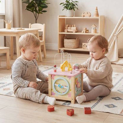 Wooden activity cube with Montessori sensory toys for toddlers 18+ months, featuring colorful beads, shapes, and spinning elements.