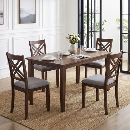 Set of four brown wooden dining chairs with fabric padded seats and solid rubber wood construction for kitchen dining room.