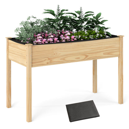 Wooden raised vegetable garden bed with natural finish, ideal for outdoor vegetable planting and elevated gardening.