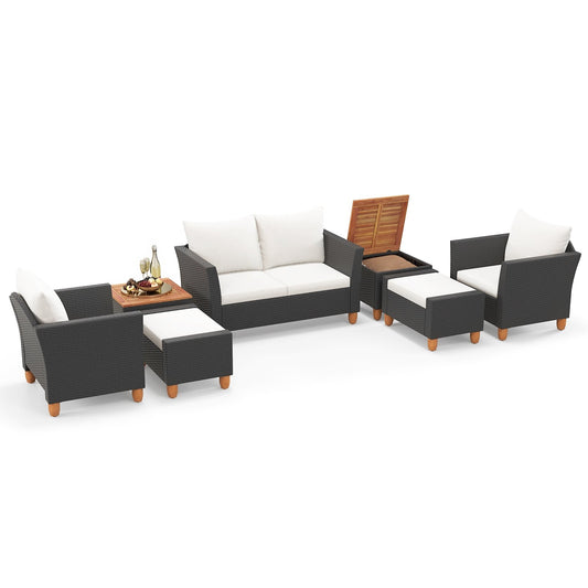 Seven-piece white outdoor patio furniture set with PE rattan sectional sofa, armchairs, and table for outdoor conversation.
