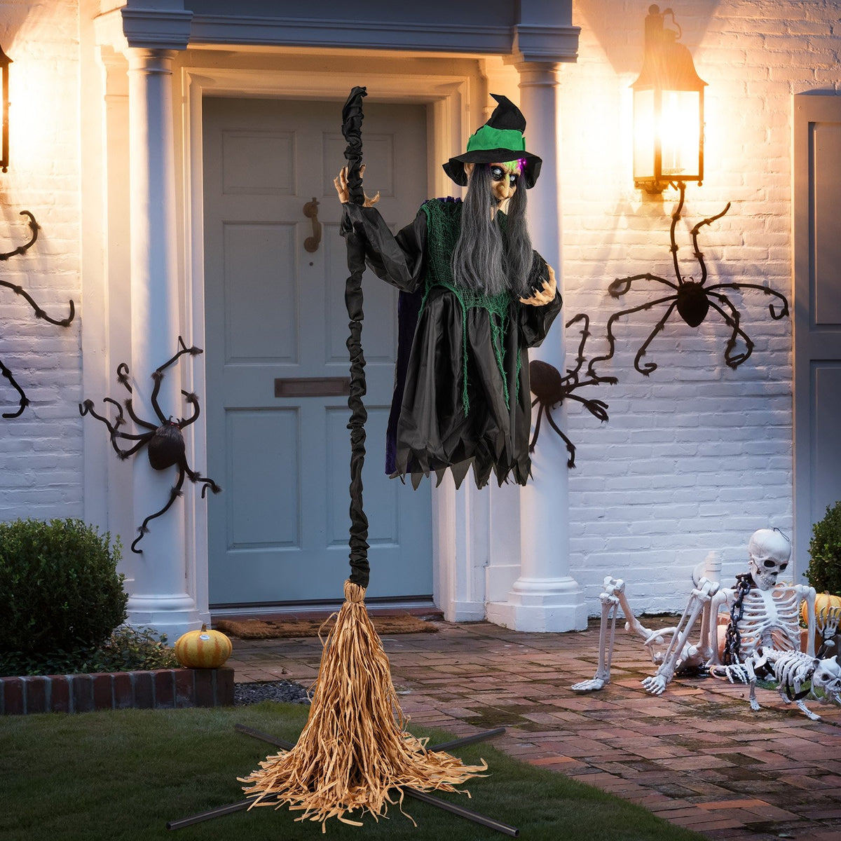7-foot witch on broom Halloween animatronic with LED lights, spooky decor for holiday Halloween decorations.