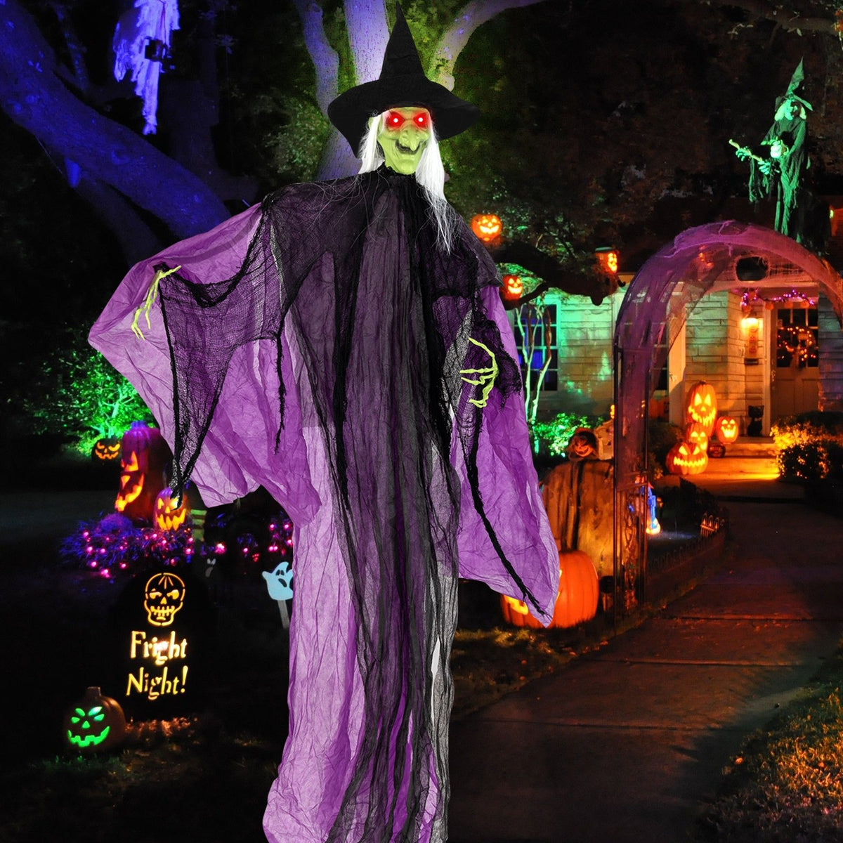 7.2 ft Halloween standing witch with lighted eyes and moving arms, holiday decor by Wilsons Home Store