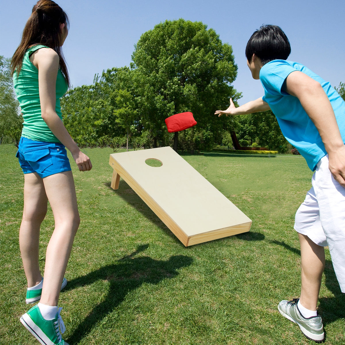 Solid wood cornhole board set with 8 bean bags, portable outdoor game for fun backyard play, by Wilsons Home Store.