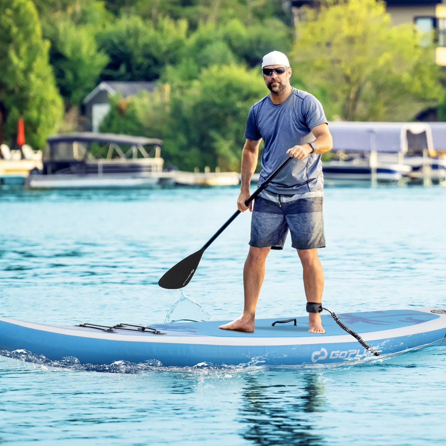 Inflatable stand-up paddle board with premium accessories, featuring a sleek design, deflated and ready for water adventures.