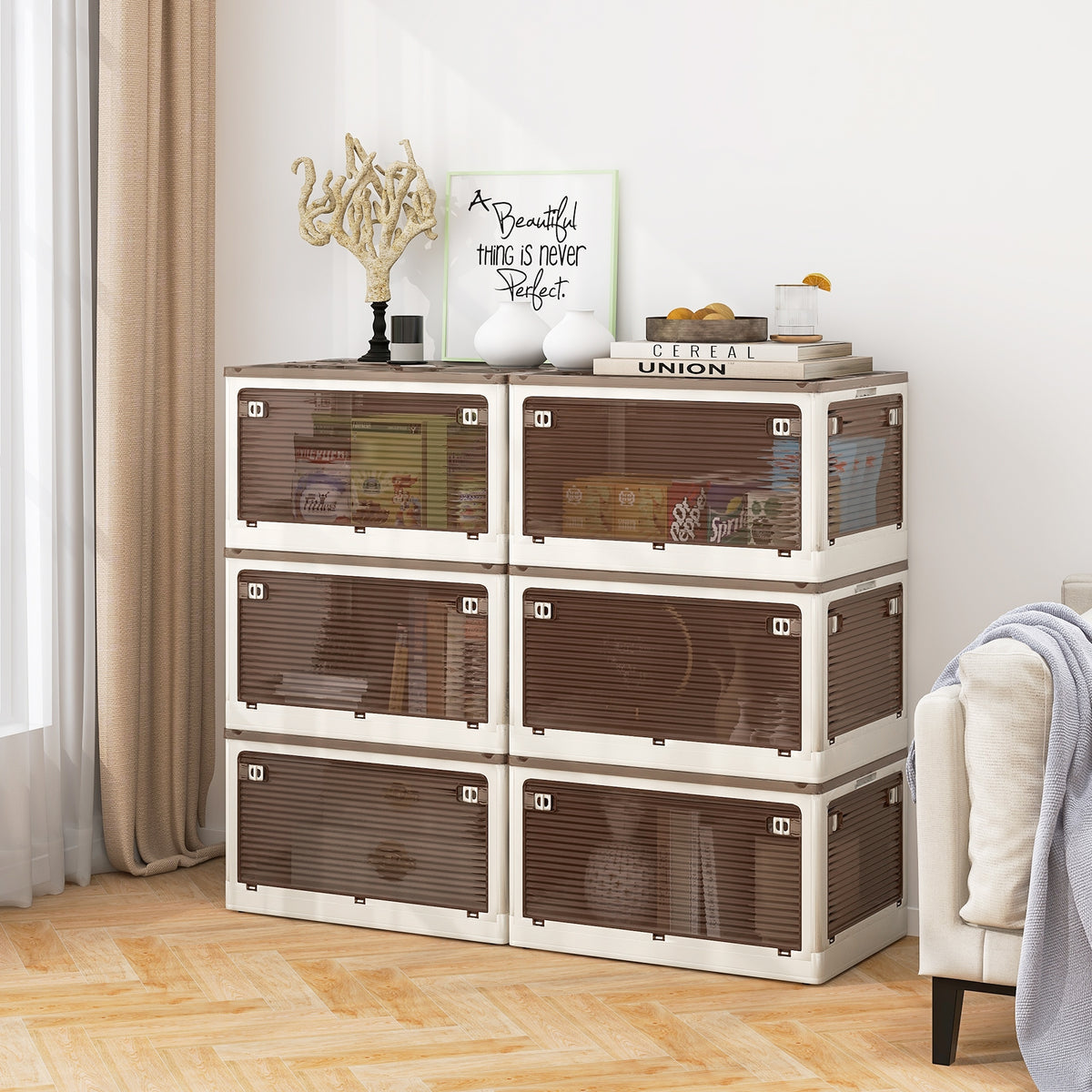 Three stackable storage bins with lids, featuring five opening options, in a neutral color for versatile living room organization.