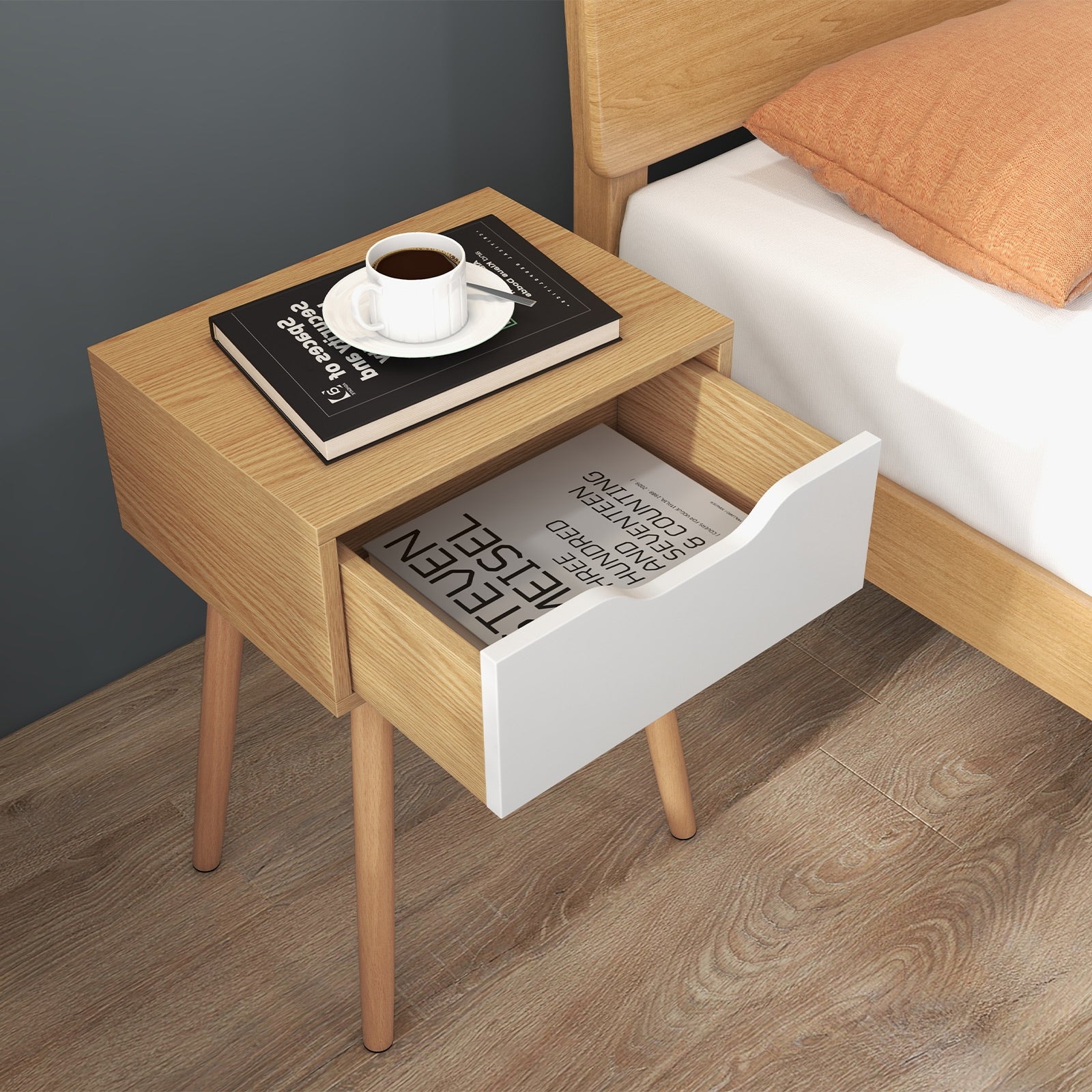 Modern Wilsons Home Store nightstand with a sleek design and storage drawer, suitable for bedroom or living room use.