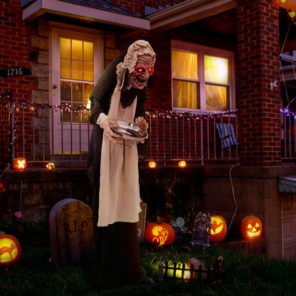 Animated Halloween old lady greeter standing with candy dish, 5.2 feet tall, holiday decoration for spooky festive decor.