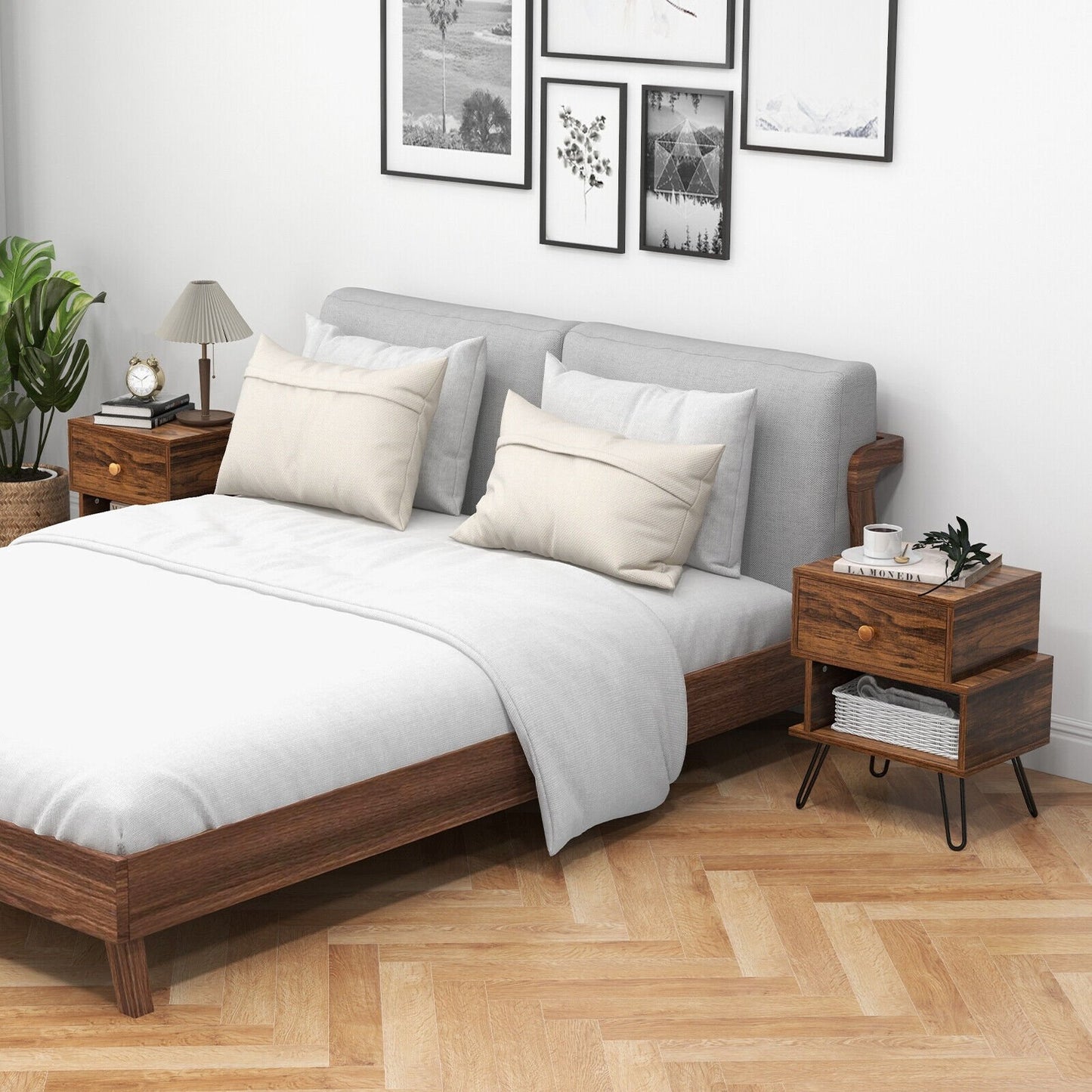 Set of two walnut wooden 2-tier nightstands with irregular design and elevated metal feet for bedroom decor.