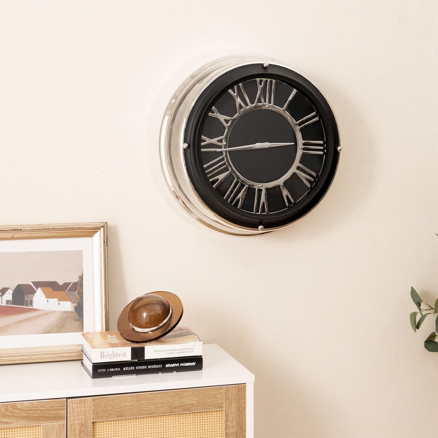 Silver frame wall clock with a 13.5/17.5 inch silent mechanism, modern home decor accent for living rooms or offices.