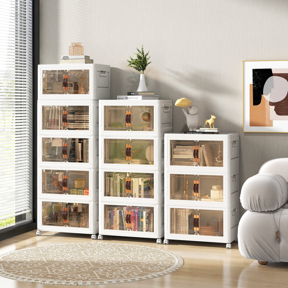 Set of four stackable storage bins with lockable wheels, designed for versatile organization in living room cabinets or chests.